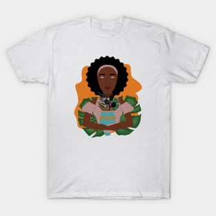 Cute African girl loves the nature and plants holding a vase of different leaves T-Shirt